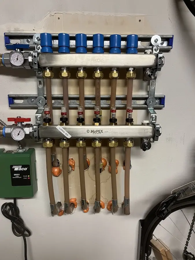 Plumber performing Water Heater Repair at a residential property in Palatine